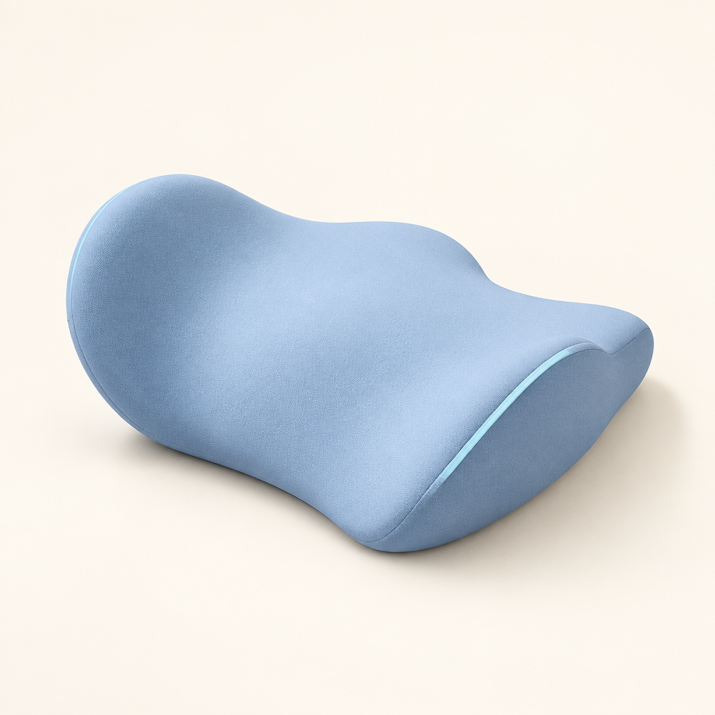 Blue contoured lumbar support pillow on a light background